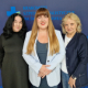 Prof. Komar, Dr Holcman i prof. Kostkiewicz na ściance w kolorze granatowym z logotypami Szpitala.